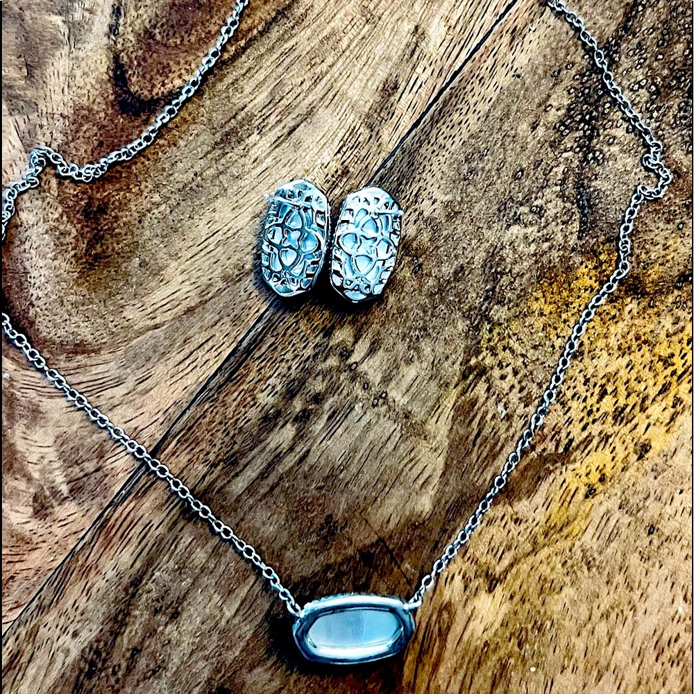 Kendra Scott Ellie Lux post earrings with light blue illusion stones.